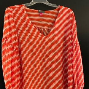 Red and white striped blouse, silky feel.